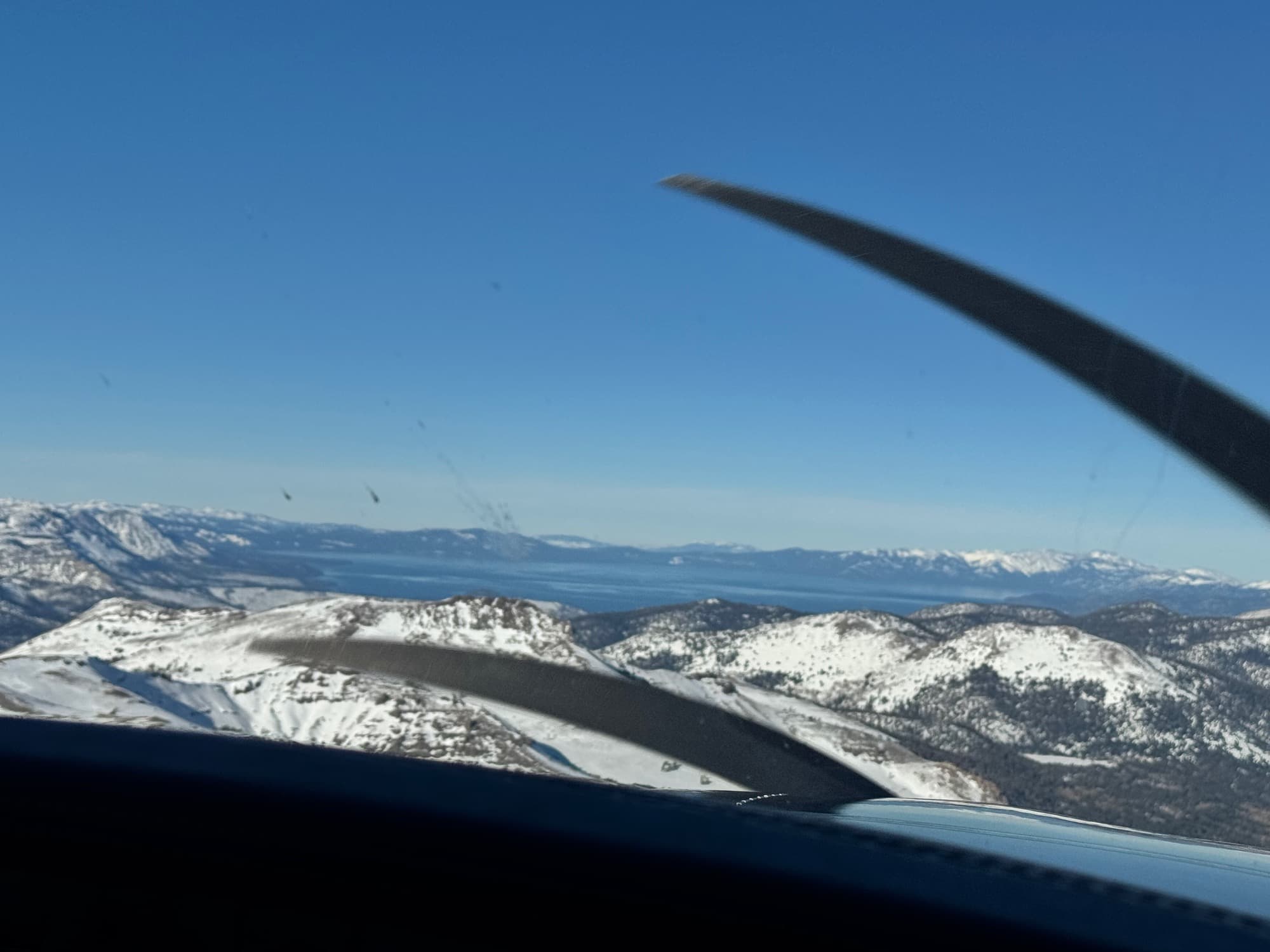 Calving glacier dropping ice into the fjord