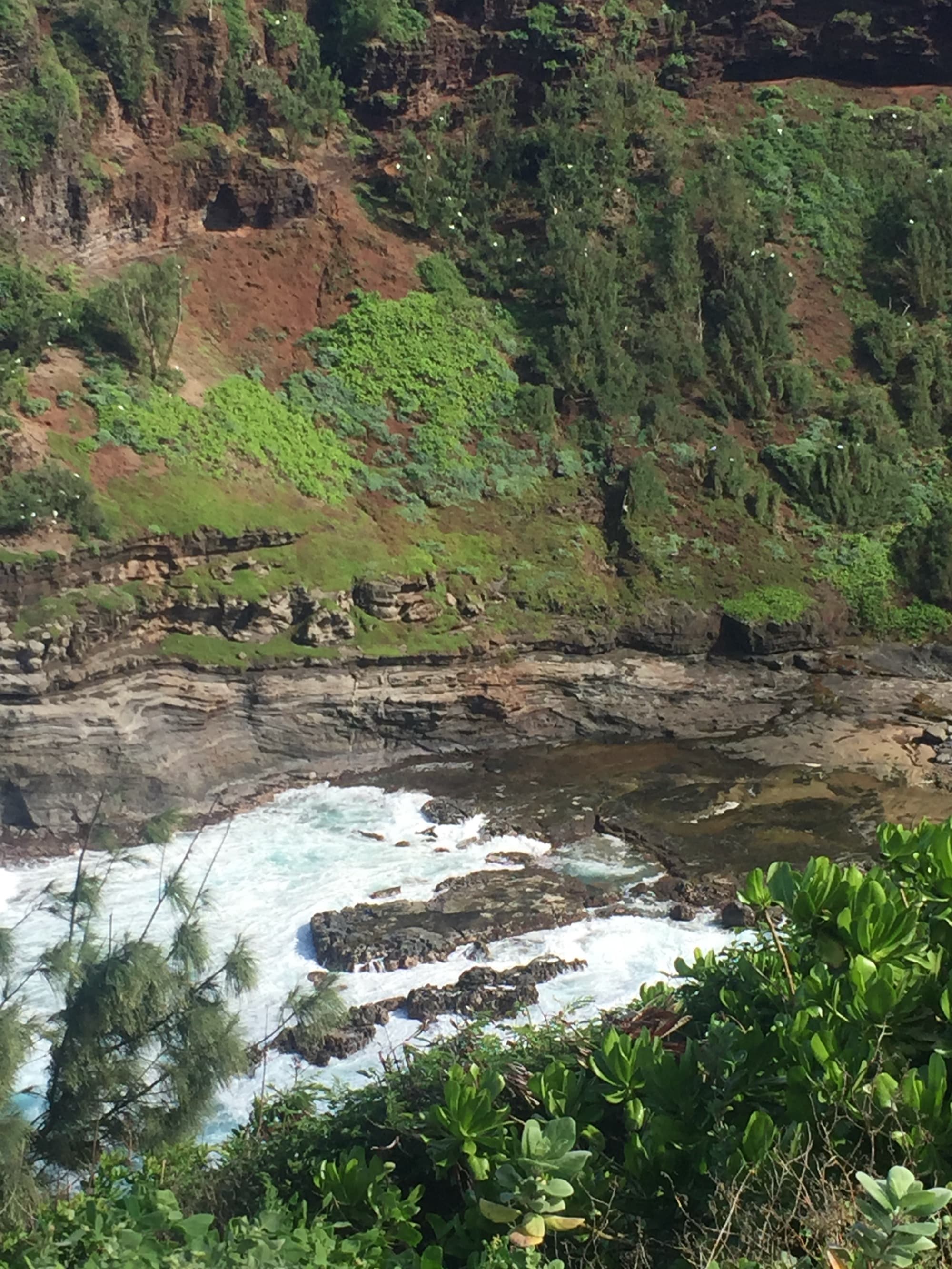 Island ridgeline draped in clouds