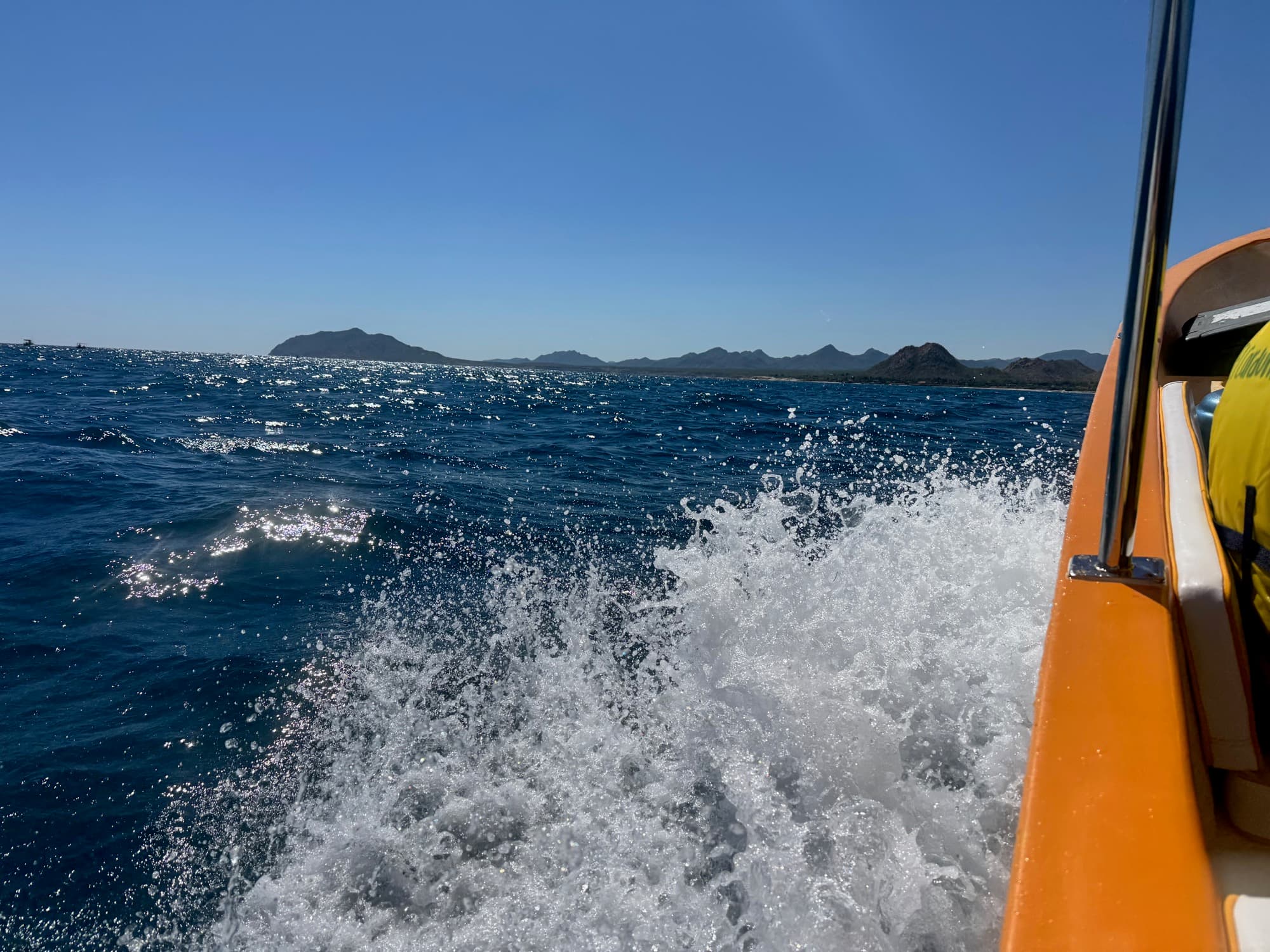 Rocky headland with waves crashing below